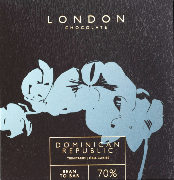 Front packaging of London Chocolate 70% Dominican Republic with black background and flowers in blue in the foreground